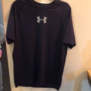 Under Armor heat gear fitted tee dark blue with vented back.